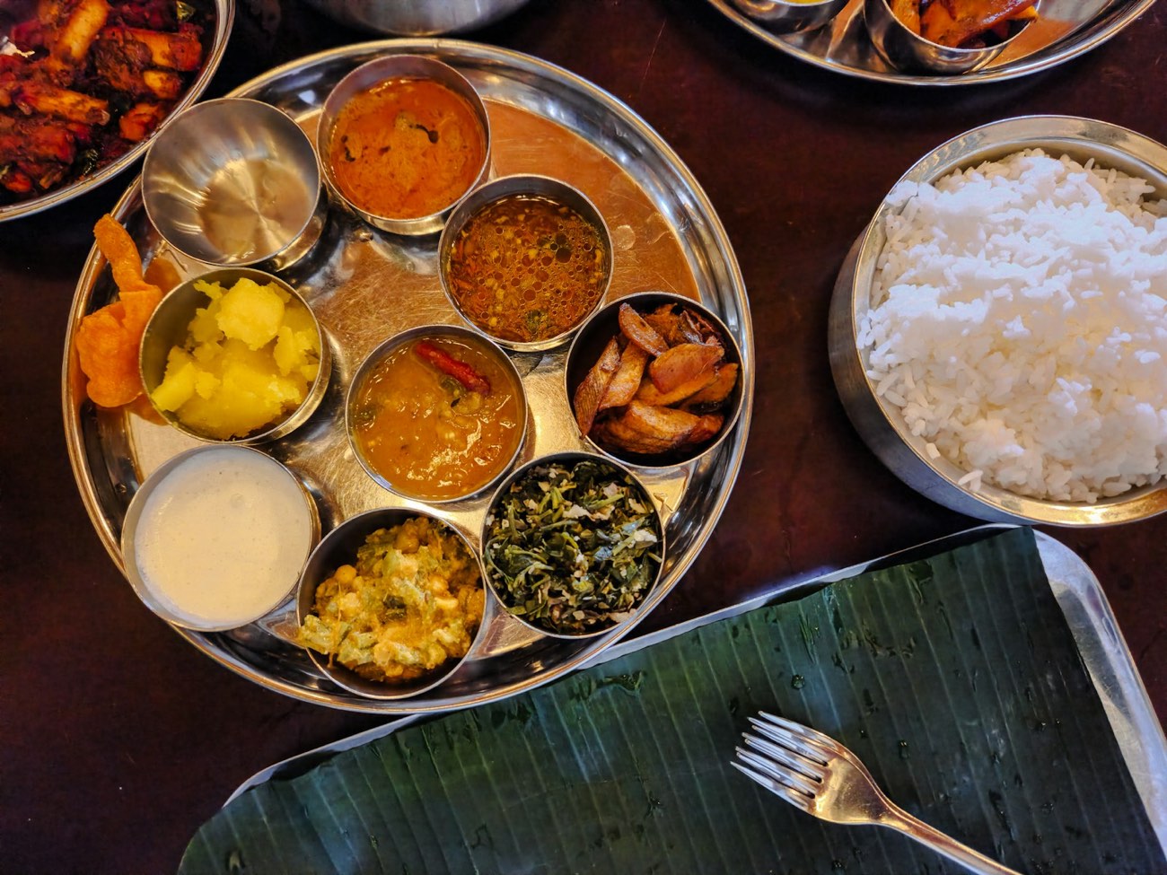 A South Indian thali served on a banana leaf
